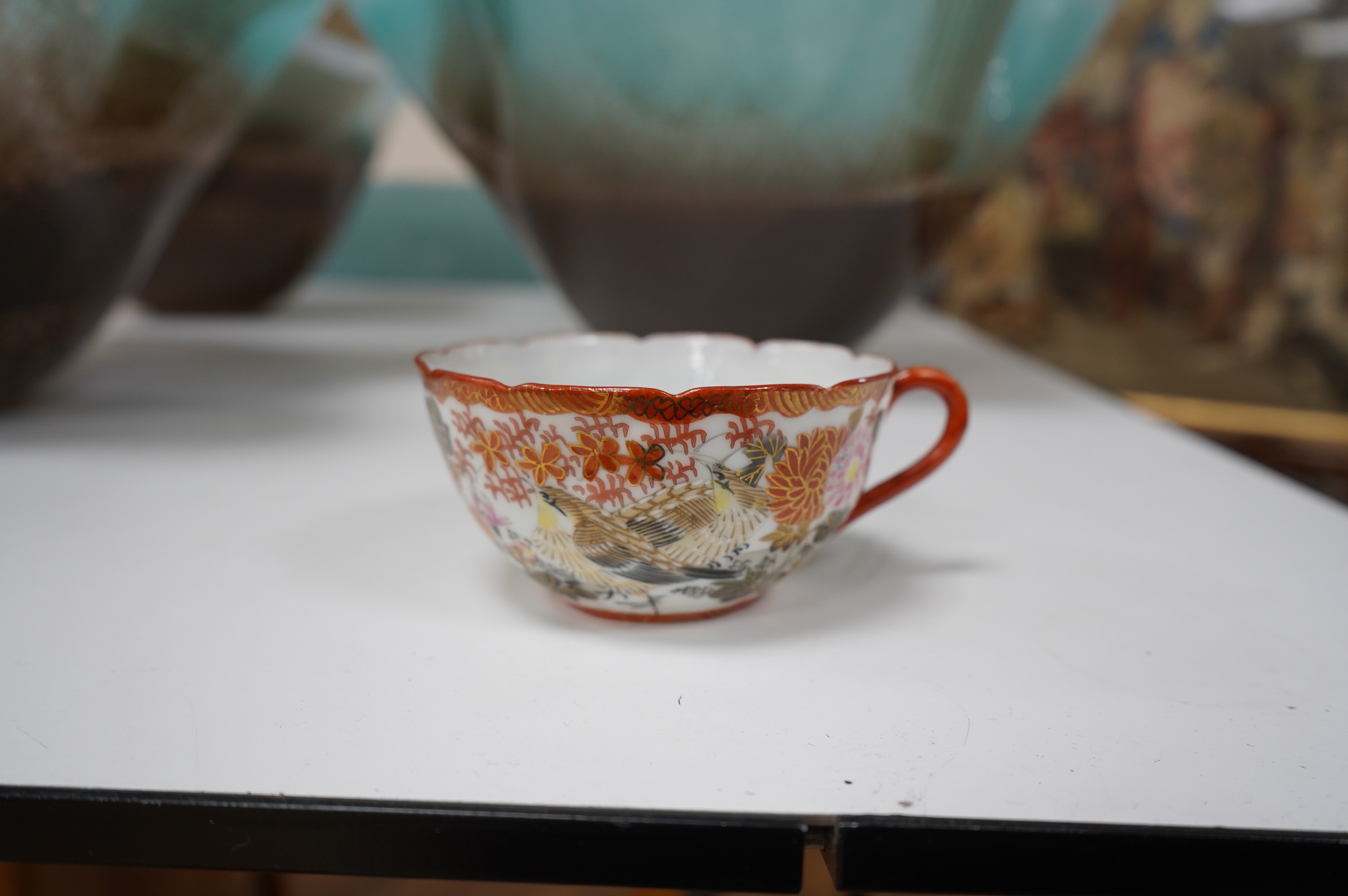 A Japanese egg shell porcelain tea set to include teapot, trios and milk jug. Condition - a few minor breakages, mostly good